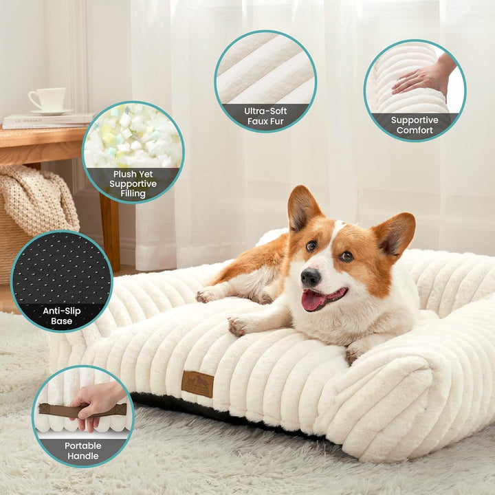 Canapea COZY KISS pentru pisici mici și mari, pat confortabil pentru pisici cu margini de susținere și bază antiderapantă, lavabil, blană artificială moale, ideal pentru sufragerie sau dormitor (crem, 65 x 44 x 30)